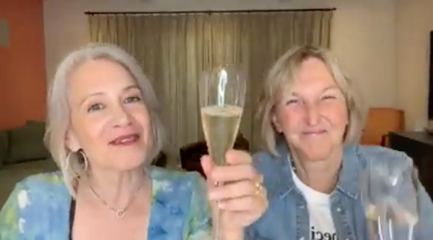 Elysabeth Alfano toasting Ingridy Newkirk's 70th birthday