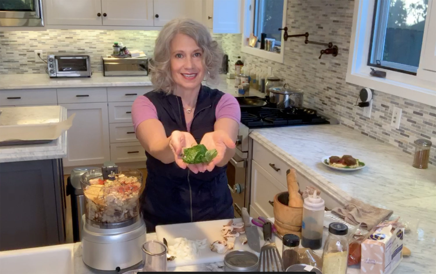 Elysabeth Alfano cooking with mint