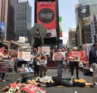 Mainstream media came out to document the Coca-Cola protest die-in!