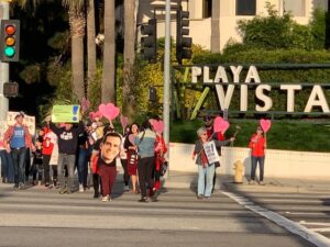 protesters marching from Playa Vista to the Ballona Wetlands