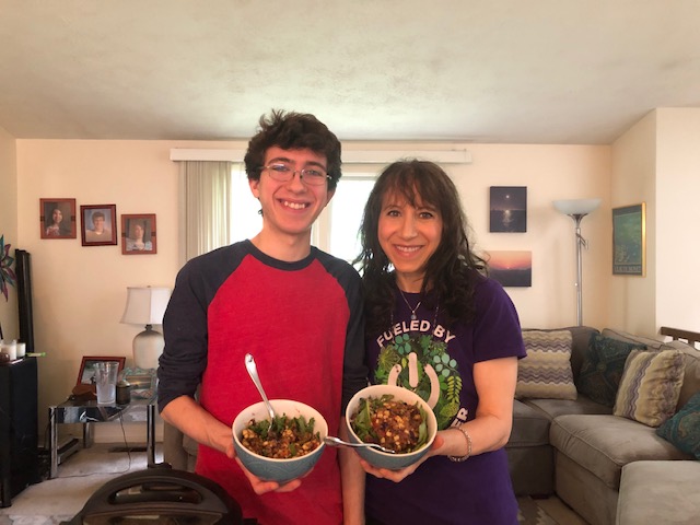 Sharon and her son with quinoa bowl