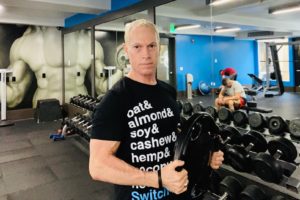 Rick Scott in the gym building strong bones.