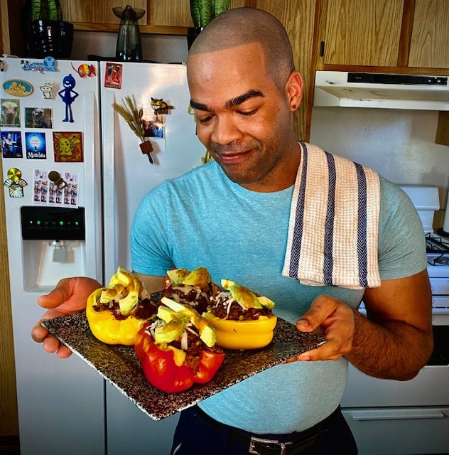 Courtney and his vegan stuffed peppers