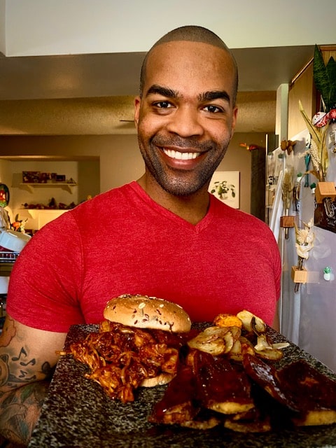Courtney Grant and his vegan pulled pork sandwich