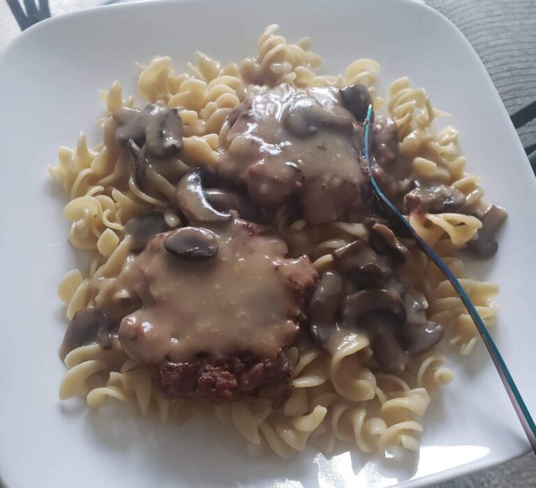 vegan steak and mushroom sauce over noodles