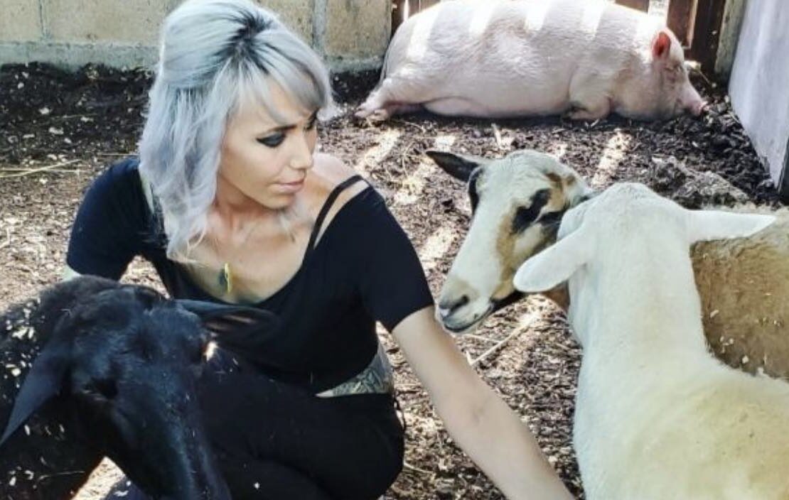 Mandy with her animal friends at Black Sheep Retreat & Sanctuary near Cancun, Mexico.