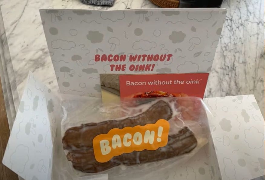 Bacon package, in a box that says 'bacon without the oink.