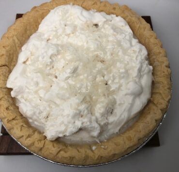 vegan coconut cream pie with whipped cream