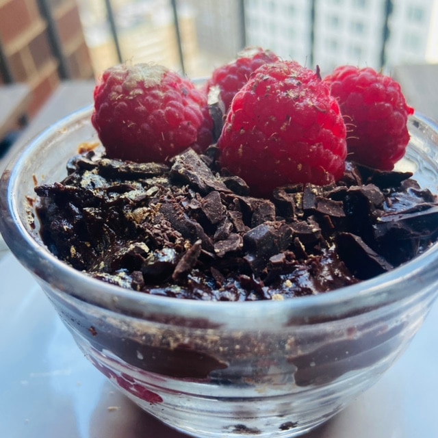 vegan pudding layered with rasberries