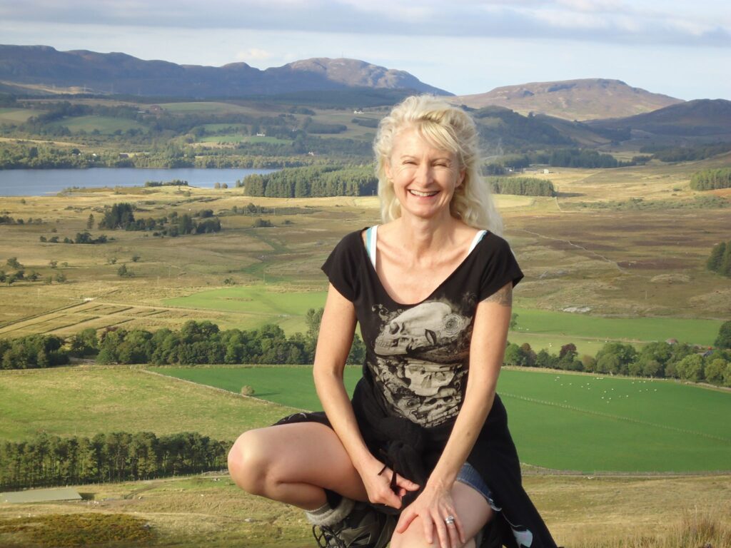 Rebecca Knowles in front to a Scottish field