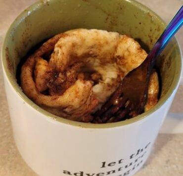 cinnamon roll in a mug