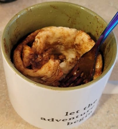 cinnamon roll in a mug
