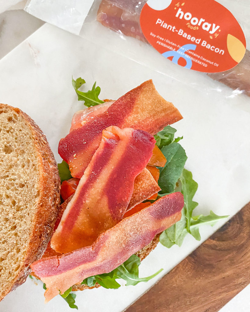 Hooray vegan bacon on a sandwich
