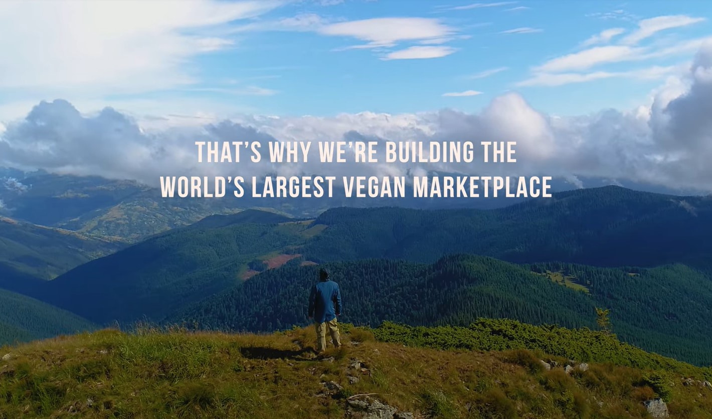 Man looking at a landscape and the words "That's why we are building the largest vegan marketplace"