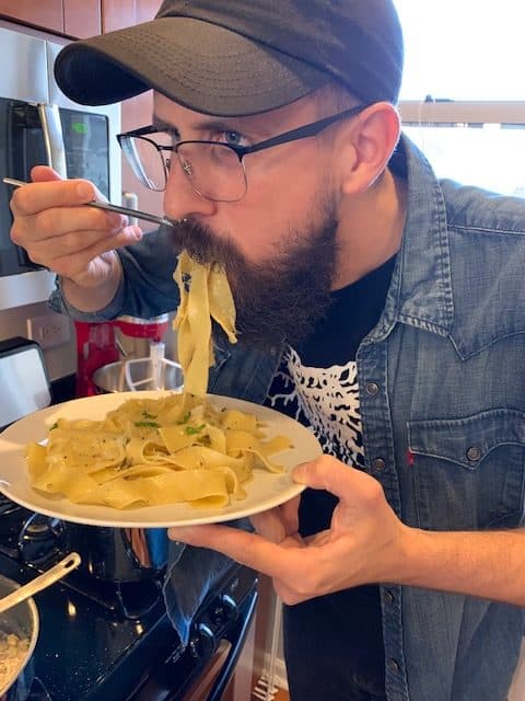 Joe eating his vegan pasta recipes