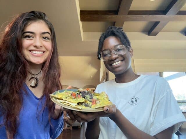 Sophia and Anaya with their vegan nachos