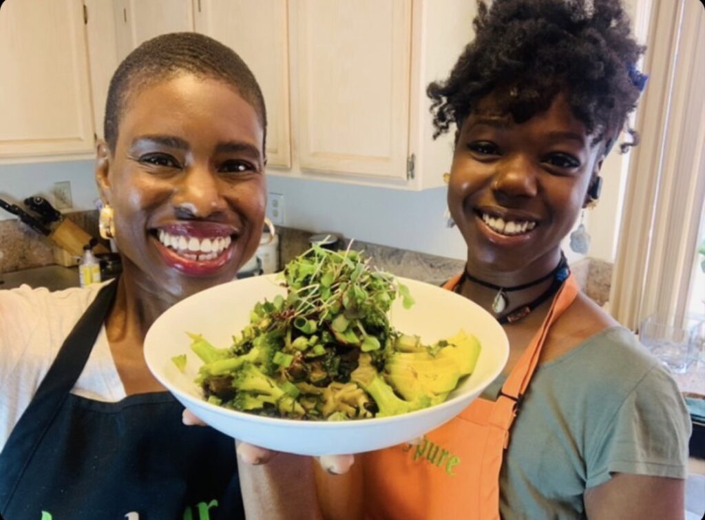 Chef Stacey and Sous Chef Uniquea with vegan fettuccine alfredo