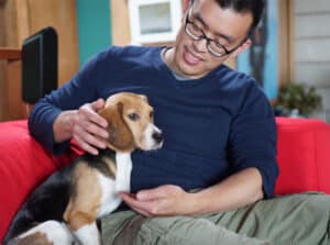 Wayne Hsiung with rescued beagle