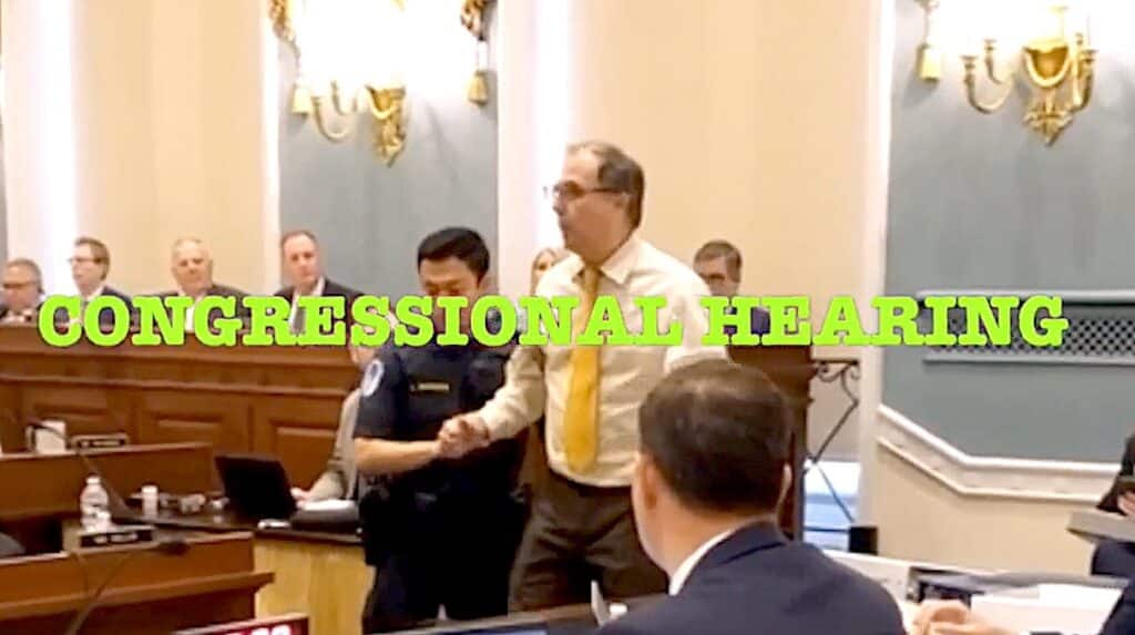 Free from Harm's Robert Grillo gets arrested at a Congressional hearing on the farm bill.