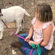 Jessica Long daughter with her goat Cedar, photo Advancing Law for Animals